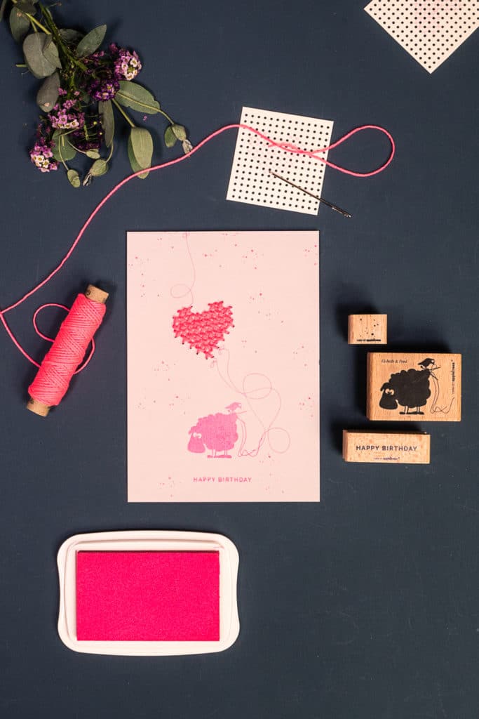 Instructions for a stamped card with pink embroidered heart