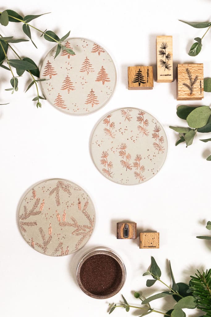Using poured concrete and embossing techniques, we stamp copper designs onto concrete coasters. Great gift idea for Christmas