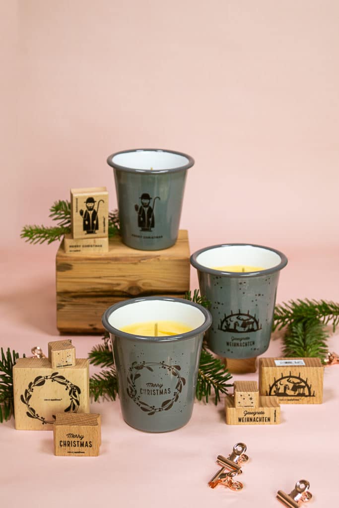 stamped enamel mugs make great containers for homemade beeswax candles